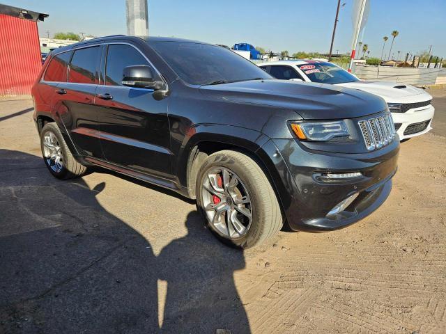 JEEP GRAND CHER 2014 with VIN 1C4RJFDJ9EC219684 - Photo from auction