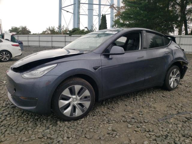 TESLA MODEL Y 2023 with VIN 7SAYGDEE3PA053796 - Photo from auction