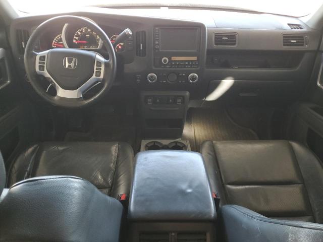 Photo 8 from auction – 2006 HONDA RIDGELINE with VIN 2HJYK16546H560464