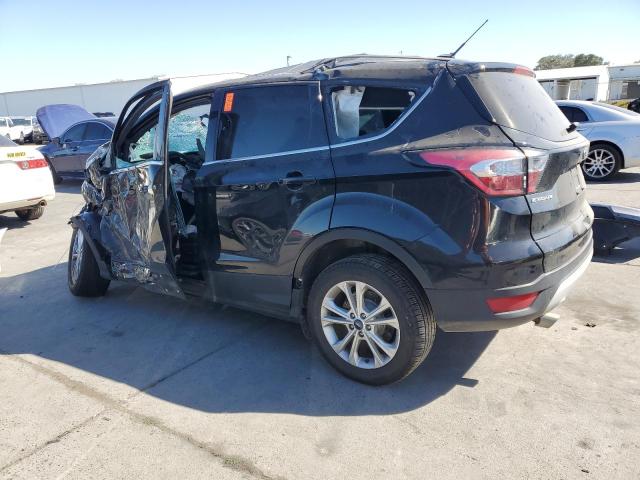 Photo 2 from auction – 2017 FORD ESCAPE SE with VIN 1FMCU9GD7HUC83589