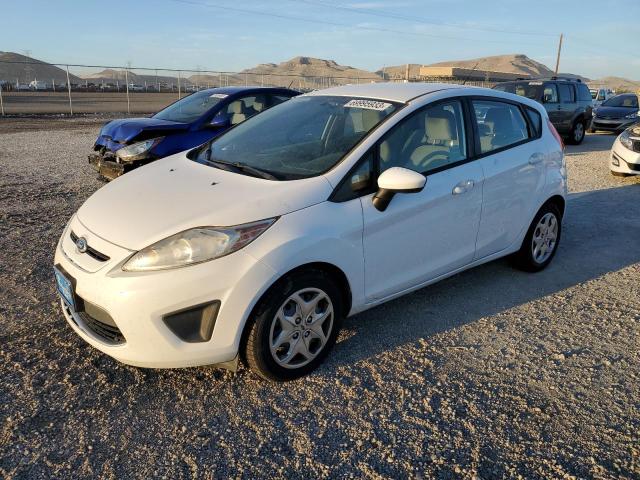 FORD FIESTA SE 2011 with VIN 3FADP4EJ3BM223936 - Photo from auction