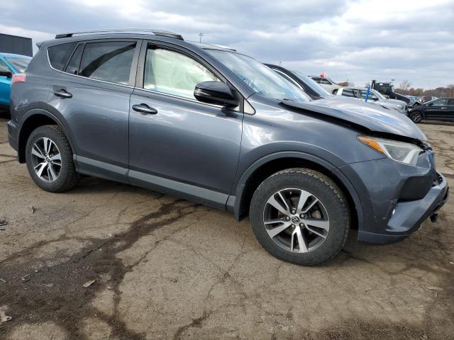 Photo 4 from auction – 2017 TOYOTA RAV4 XLE with VIN JTMRFREV2HD211266