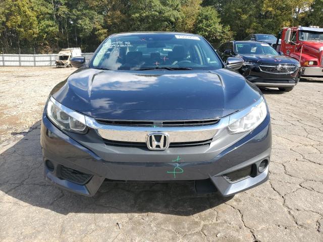 Photo 5 from auction – 2017 HONDA CIVIC LX with VIN 19XFC2F6XHE028058