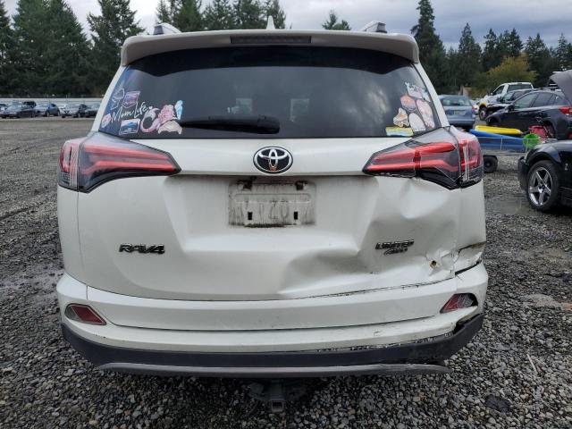Photo 6 from auction – 2018 TOYOTA RAV4 LIMIT with VIN JTMDFREV5JD233696