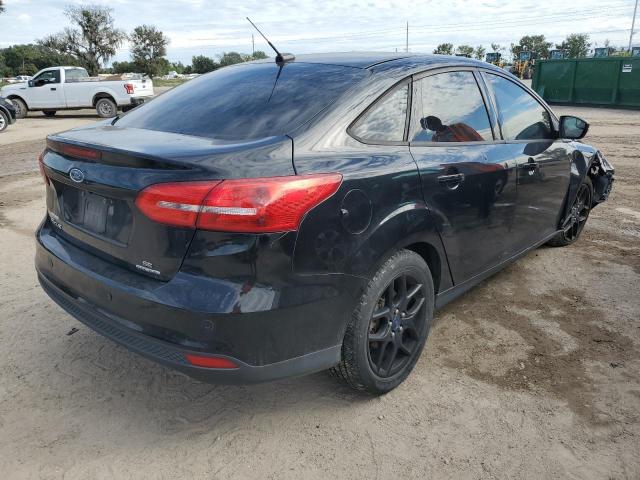 Photo 3 from auction – 2016 FORD FOCUS SE with VIN 1FADP3F27GL239079