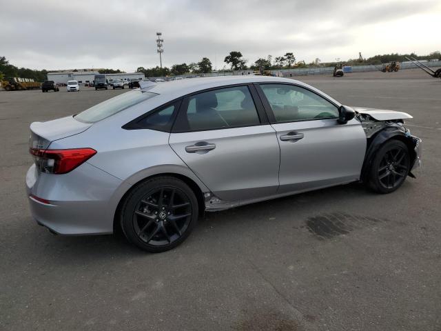 Photo 3 from auction – 2023 HONDA CIVIC SPOR with VIN 2HGFE2F52PH511498