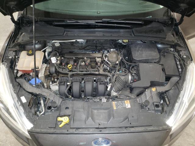 Photo 11 from auction – 2015 FORD FOCUS TITA with VIN 1FADP3J20FL220640
