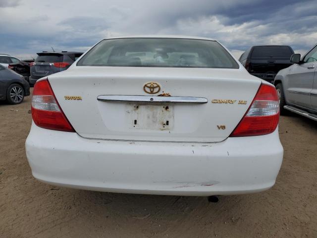 Photo 6 from auction – 2002 TOYOTA CAMRY LE with VIN JTDBF32K520001204