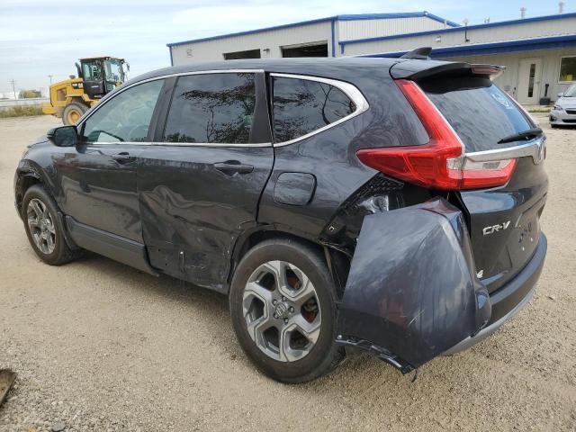 Photo 2 from auction – 2018 HONDA CR-V EXL with VIN 7FARW2H88JE048641