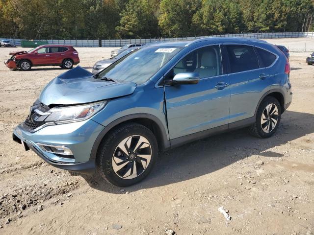 Photo 1 from auction – 2015 HONDA CR-V TOURI with VIN 5J6RM3H94FL017675