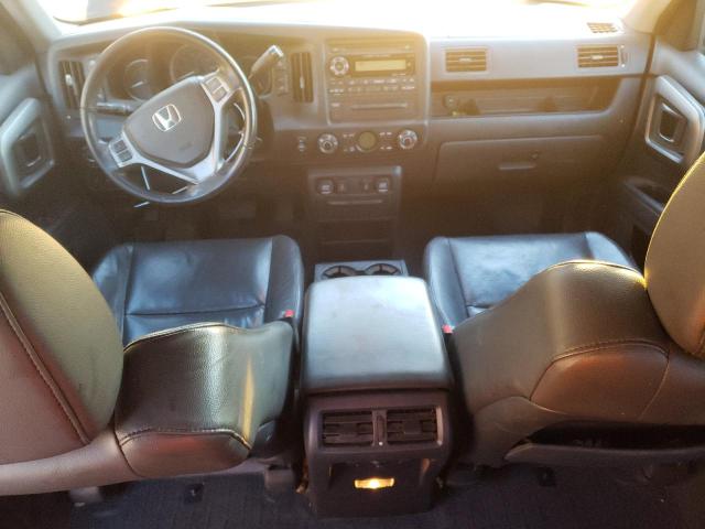 Photo 8 from auction – 2010 HONDA RIDGELINE with VIN 5FPYK1F50AB003304