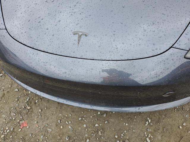 Photo 11 from auction – 2022 TESLA MODEL 3 with VIN 5YJ3E1EC1NF263050