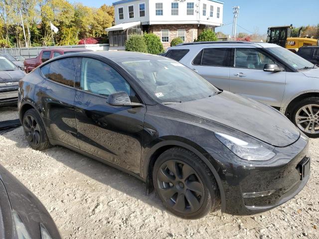 Photo 4 from auction – 2023 TESLA MODEL Y with VIN 7SAYGDEE2PF859177
