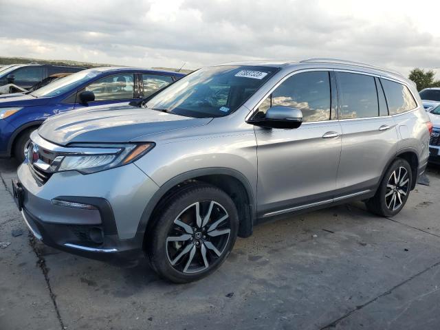 HONDA PILOT ELIT 2020 with VIN 5FNYF6H00LB064134 - Photo from auction