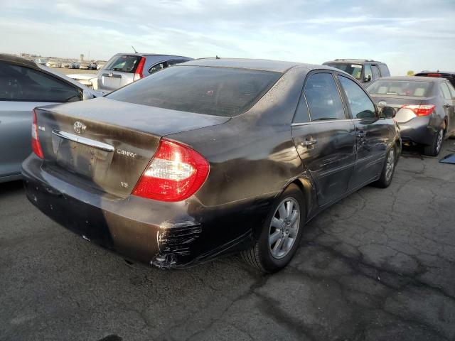 Photo 3 from auction – 2002 TOYOTA CAMRY LE with VIN JTDBF30K320020577