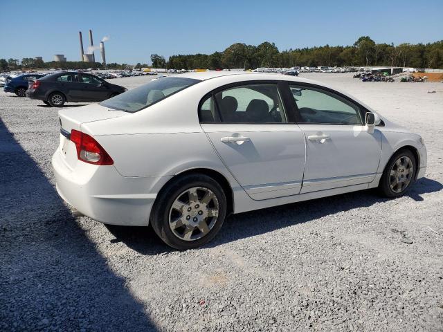 Photo 3 from auction – 2011 HONDA CIVIC LX with VIN 19XFA1F54BE032590