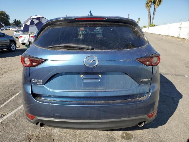 Photo 6 from auction – 2021 MAZDA CX-5 TOURI with VIN JM3KFBCM6M0447947