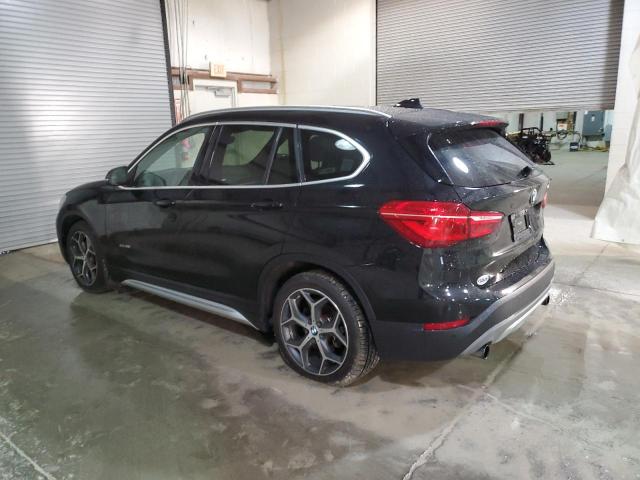 Photo 2 from auction – 2016 BMW X1 XDRIVE2 with VIN WBXHT3C32G5F63829