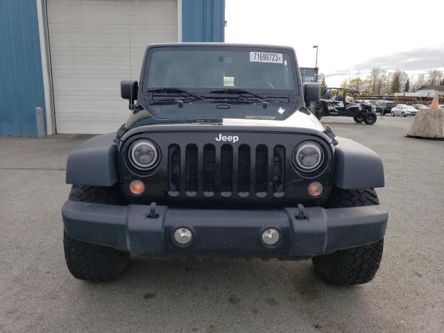 Photo 5 from auction – 2014 JEEP WRANGLER U with VIN 1C4BJWDG5EL127638