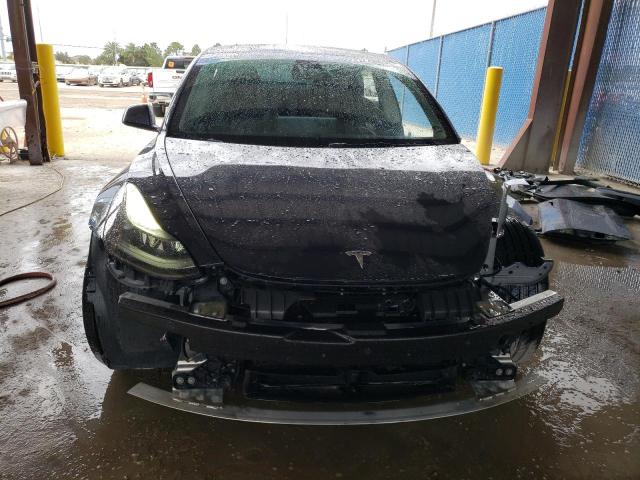 Photo 5 from auction – 2022 TESLA MODEL 3 with VIN 5YJ3E1EB7NF203300