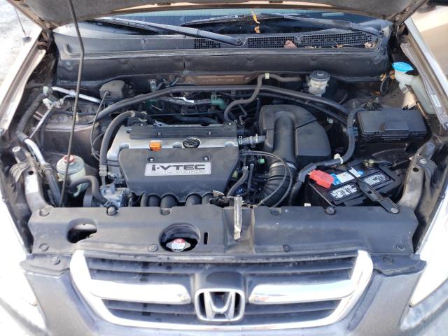 Photo 11 from auction – 2002 HONDA CR-V LX with VIN JHLRD68452C026281