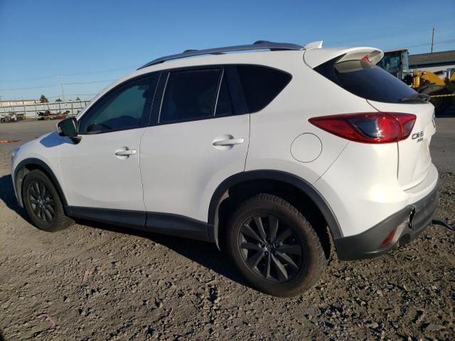 Photo 2 from auction – 2013 MAZDA CX-5 TOURI with VIN JM3KE4CE1D0120749