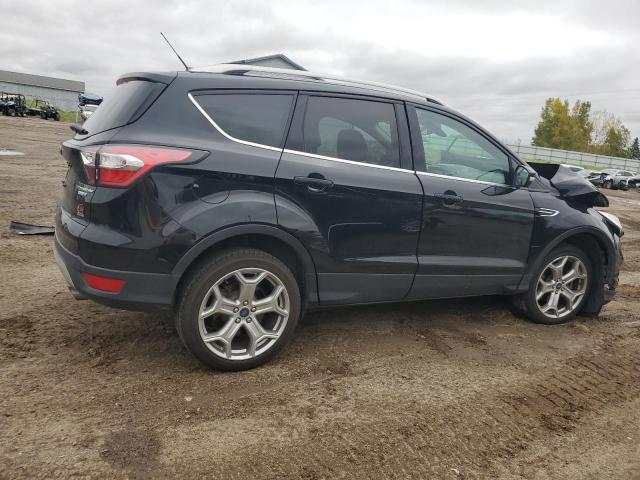 Photo 3 from auction – 2017 FORD ESCAPE TIT with VIN 1FMCU9JD5HUA61545