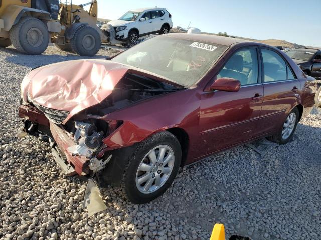 TOYOTA CAMRY LE 2002 with VIN JTDBF30K320044894 - Photo from auction