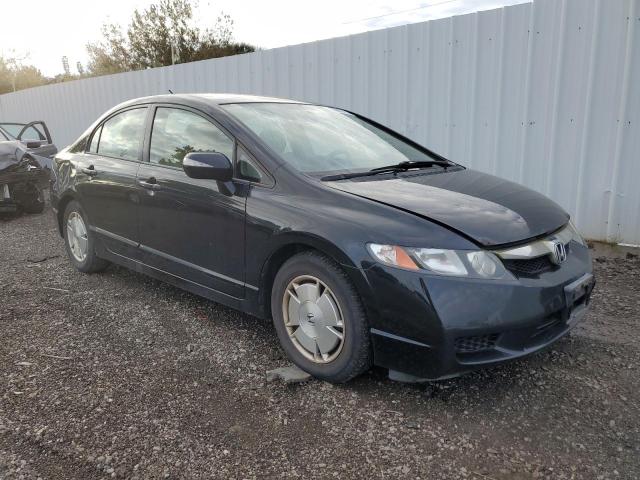 Photo 4 from auction – 2010 HONDA CIVIC HYBR with VIN JHMFA3F23AS007322