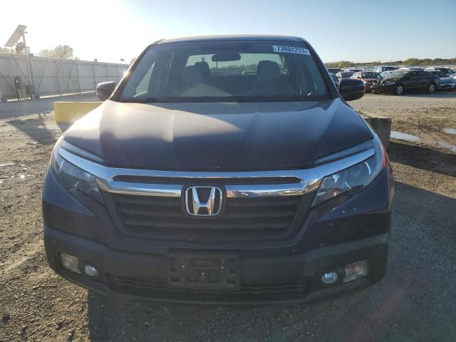 Photo 5 from auction – 2017 HONDA RIDGELINE with VIN 5FPYK3F51HB017671