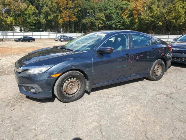 HONDA CIVIC LX 2017 with VIN 19XFC2F6XHE028058 - Photo from auction