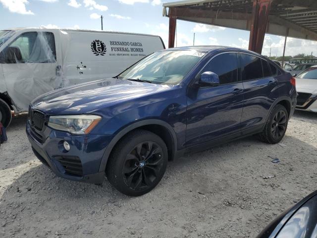 BMW X4 XDRIVE2 2015 with VIN 5UXXW3C57F0M87694 - Photo from auction