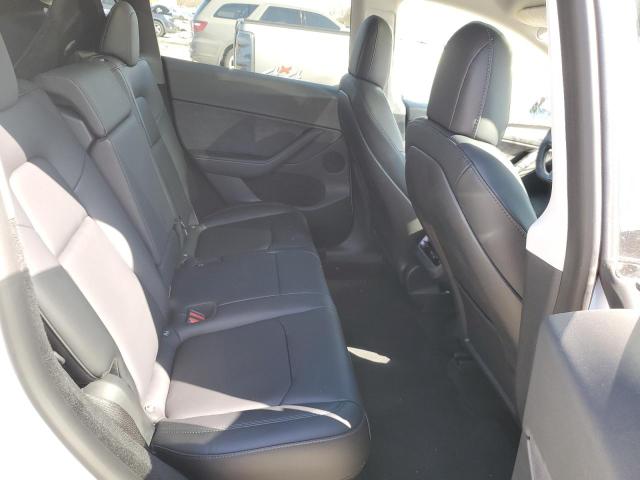 Photo 10 from auction – 2023 TESLA MODEL Y with VIN 7SAYGDEE8PF668783
