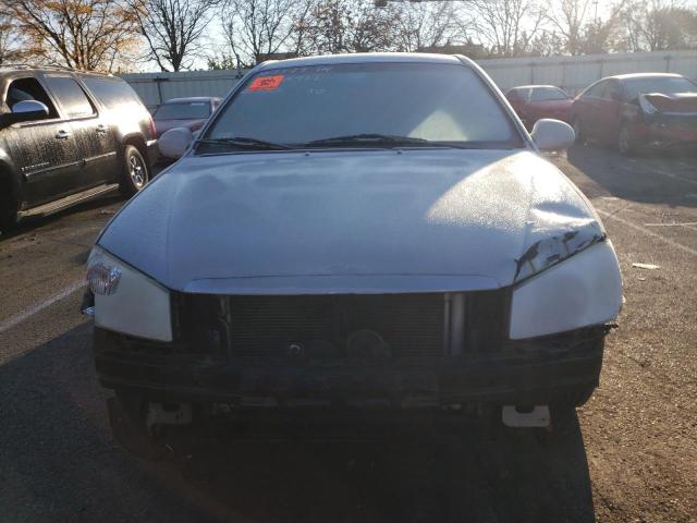 Photo 5 from auction – 2004 KIA SPECTRA LX with VIN KNAFE121645011310