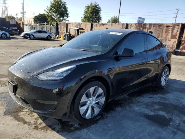 TESLA MODEL Y 2023 with VIN 7SAYGDEE7PA027444 - Photo from auction