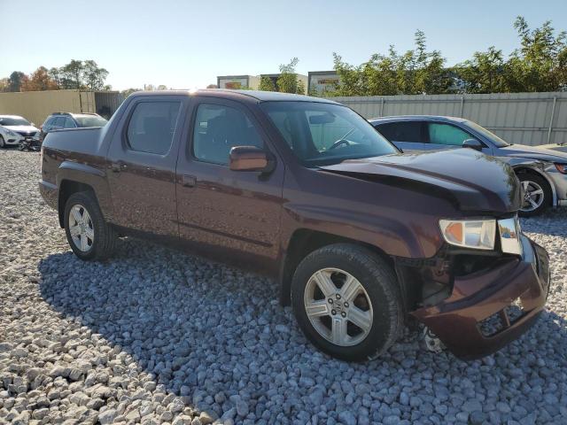 Photo 4 from auction – 2010 HONDA RIDGELINE with VIN 5FPYK1F55AB013519