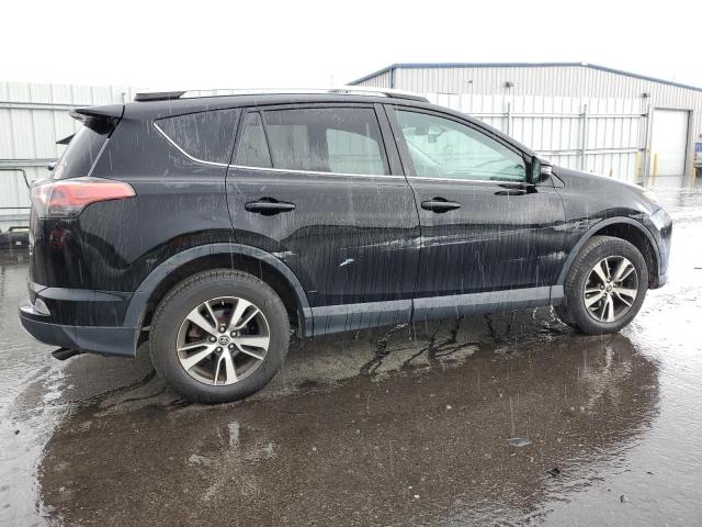 Photo 3 from auction – 2016 TOYOTA RAV4 XLE with VIN 2T3RFREV0GW460263