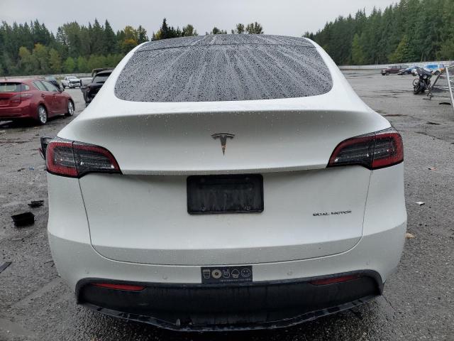 Photo 6 from auction – 2020 TESLA MODEL Y with VIN 5YJYGDEEXLF051182