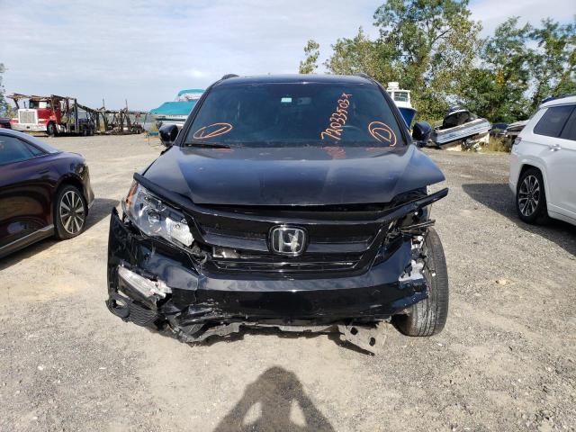 Photo 5 from auction – 2022 HONDA PILOT TRAI with VIN 5FNYF6H88NB045257