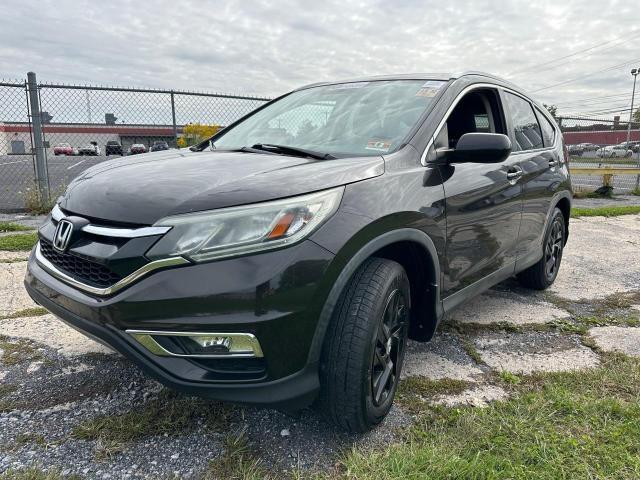 Photo 2 from auction – 2016 HONDA CR-V EXL with VIN 2HKRM4H75GH624250