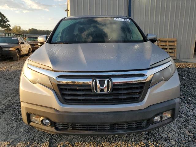 Photo 5 from auction – 2017 HONDA RIDGELINE with VIN 5FPYK3F69HB018544