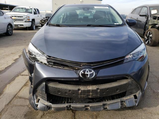 Photo 5 from auction – 2018 TOYOTA COROLLA L with VIN 5YFBURHE3JP831985