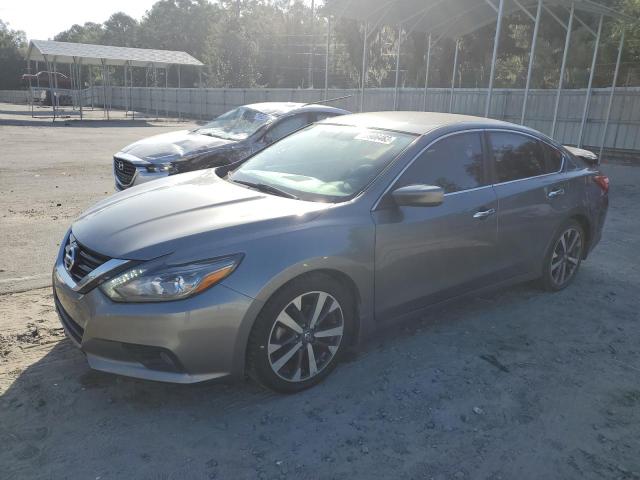 NISSAN ALTIMA 3.5 2016 with VIN 1N4BL3AP6GC255411 - Photo from auction