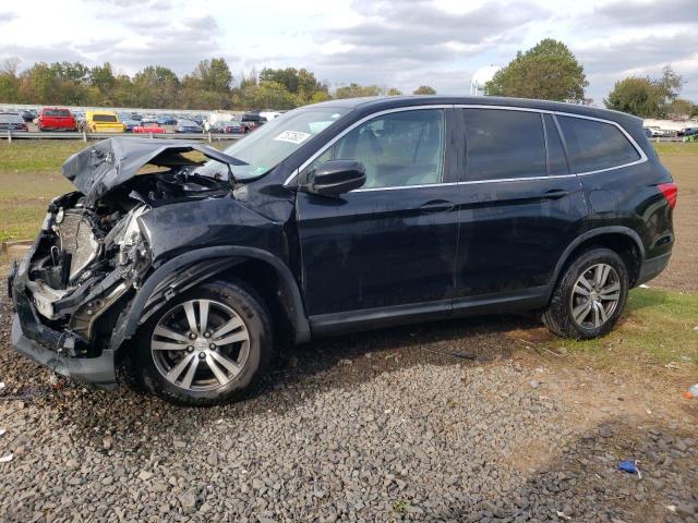 HONDA PILOT EXL 2016 with VIN 5FNYF6H54GB030599 - Photo from auction