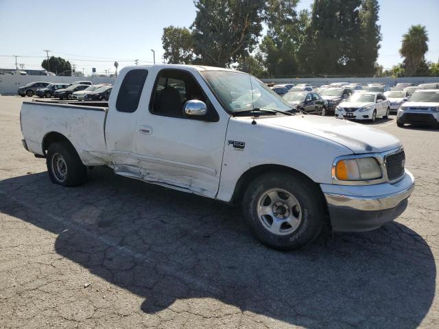 Photo 4 from auction – 2000 FORD F150 with VIN 1FTRX17L9YKA59203