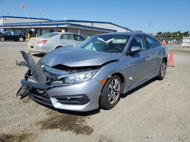 HONDA CIVIC LX 2018 with VIN 2HGFC2F57JH554246 - Photo from auction