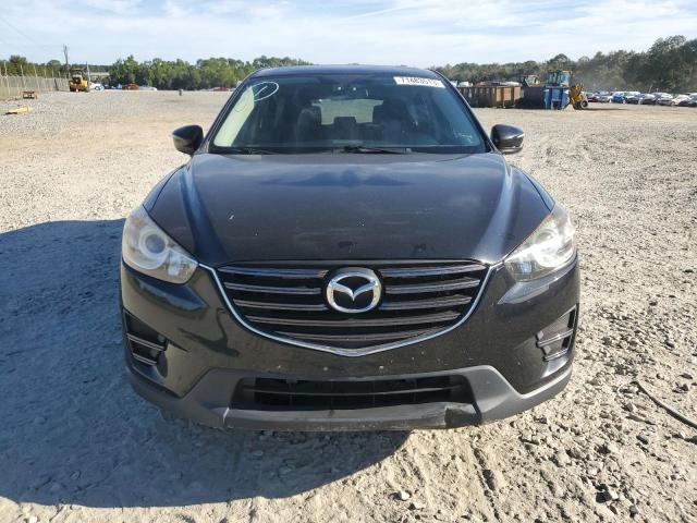 Photo 5 from auction – 2016 MAZDA CX-5 SPORT with VIN JM3KE4BY4G0634739