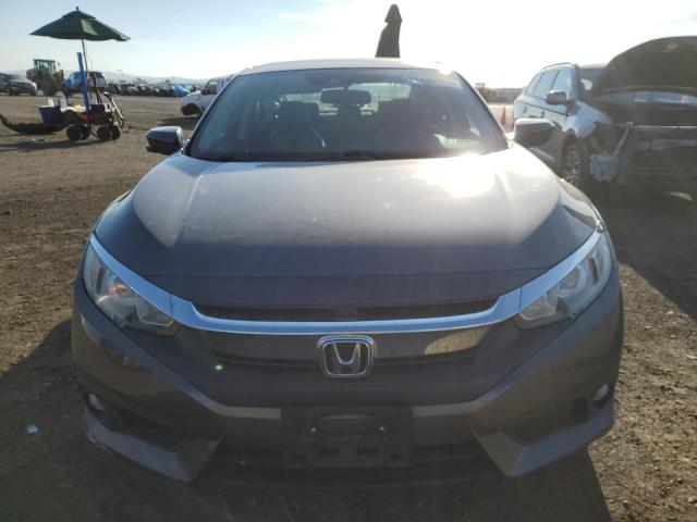 Photo 5 from auction – 2016 HONDA CIVIC EX with VIN 19XFC1F84GE031368