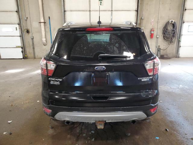 Photo 6 from auction – 2017 FORD ESCAPE TIT with VIN 1FMCU9J9XHUD92729