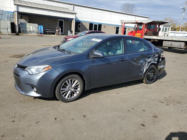 TOYOTA COROLLA L 2015 with VIN 2T1BURHE6FC243148 - Photo from auction